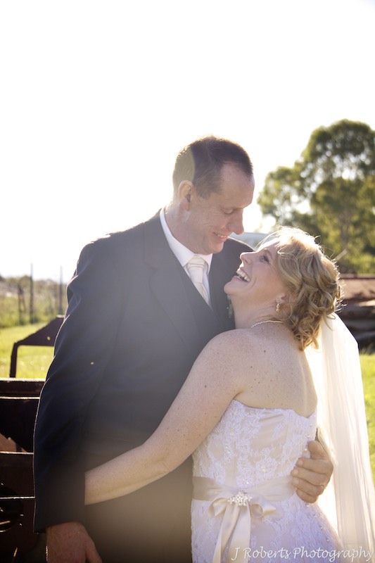 Bride and groom laughing - wedding photography sydney